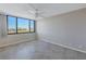 Spacious bedroom with tile floors and large window at 6372 Palma Del Mar S Blvd # 505, St Petersburg, FL 33715