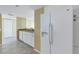 White kitchen with granite countertops and stainless steel appliances at 6372 Palma Del Mar S Blvd # 505, St Petersburg, FL 33715