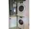 Laundry area with a stacked washer and dryer unit at 7750 92Nd St # 208, Seminole, FL 33777