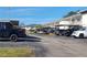 Cars parked under a covered parking area attached to a residential building at 7750 92Nd St # 208, Seminole, FL 33777