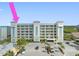 Modern condo building with ample parking and waterfront views at 19519 Gulf Blvd # 601, Indian Shores, FL 33785