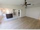 Living room with hardwood floors and a view of the kitchen at 2060 6Th St, Sarasota, FL 34237