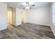 Spacious bedroom with walk-in closet and wood-look floors at 2529 Harn Blvd # 5, Clearwater, FL 33764