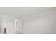 Bright bedroom featuring a walk-in closet at 3065 Winding Creek Trl, North Port, FL 34289