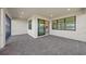 Spacious screened-in lanai with room for outdoor living and dining at 3065 Winding Creek Trl, North Port, FL 34289