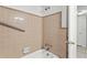 Bathroom with tub, shower, and grab bar at 309 W Louisiana Ave, Tampa, FL 33603