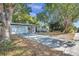 Newly renovated home with a charming front porch and landscaped yard at 3534 Bluebird Dr, New Port Richey, FL 34652