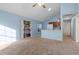 Light and airy living room with vaulted ceiling and carpet at 3705 Simpson Ct, Palm Harbor, FL 34684