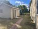 Backyard with shed and walkway at 4109 E Hanna Ave, Tampa, FL 33610