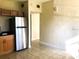 Kitchen with stainless steel refrigerator and wood cabinets at 4409 W Paris St, Tampa, FL 33614