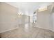 Bright dining room with tile floors and access to the backyard at 4511 Oak River Cir, Valrico, FL 33596