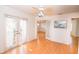 Bedroom with wood floors and French doors leading to a balcony at 5400 Bates St, Seminole, FL 33772