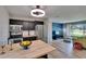 Modern kitchen with stainless appliances, wood countertop, and open living space at 6524 14Th N St, St Petersburg, FL 33702