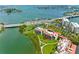 Aerial view highlighting condo's waterfront location and proximity to community amenities at 7871 Sailboat Key S Blvd # 106, South Pasadena, FL 33707