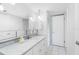 Bathroom with marble-top vanity and good storage at 7871 Sailboat Key S Blvd # 106, South Pasadena, FL 33707
