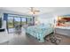 Spacious bedroom with king-size bed and water views at 7871 Sailboat Key S Blvd # 106, South Pasadena, FL 33707