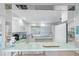 Kitchen with pass-through to dining area at 7871 Sailboat Key S Blvd # 106, South Pasadena, FL 33707