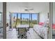 Bright lanai with outdoor furniture, offering scenic views at 7871 Sailboat Key S Blvd # 106, South Pasadena, FL 33707