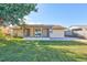 Backyard with screened porch and fenced area at 8840 Cairo Ln, Port Richey, FL 34668