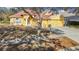 Charming two-story home with a red tile roof, nestled among trees at 16829 Midsummer Ln, Spring Hill, FL 34610