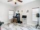 Game room with multiple arcade games, a computer, and stylish marble tile flooring at 16829 Midsummer Ln, Spring Hill, FL 34610