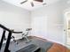 Well-equipped home gym with various exercise machines and ample space at 16829 Midsummer Ln, Spring Hill, FL 34610