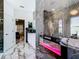 Modern Primary bathroom with double vanity, fireplace, and soaking tub at 16829 Midsummer Ln, Spring Hill, FL 34610
