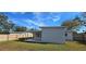 Lush backyard with a well-maintained lawn, offering privacy and space for outdoor enjoyment at 1722 St Croix Dr, Clearwater, FL 33759