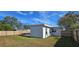 Spacious backyard with green grass, providing a serene outdoor setting at 1722 St Croix Dr, Clearwater, FL 33759