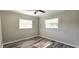 Bedroom with wood-look floors and fresh paint at 1722 St Croix Dr, Clearwater, FL 33759