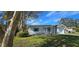 Charming single-story home with a well-manicured lawn and lovely curb appeal at 1722 St Croix Dr, Clearwater, FL 33759
