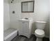 Updated bathroom with white vanity and shower at 2009 Wishing Well Way, Tampa, FL 33619