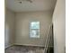 Empty bedroom with a window and ceiling fan at 2120 W Beach St, Tampa, FL 33607