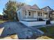 Charming single-Gathering home with a covered front porch and updated exterior at 2120 W Beach St, Tampa, FL 33607
