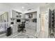 Home office with gray cabinets, a desk, and ample storage space at 36750 Us Highway 19 N # 06110, Palm Harbor, FL 34684