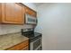 Well-equipped kitchen with stainless steel appliances at 5440 Macdill S Ave # 2E, Tampa, FL 33611