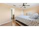Comfortable bedroom with ensuite bathroom and warm, neutral-toned walls at 6321 Newtown Cir # 21B4, Tampa, FL 33615