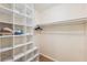 Spacious walk-in closet with built-in shelving and ample hanging space at 6321 Newtown Cir # 21B4, Tampa, FL 33615