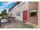 The entryway with red door and a walkway at 6321 Newtown Cir # 21B4, Tampa, FL 33615