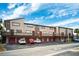 Condo building exterior with parking and balconies at 6321 Newtown Cir # 21B4, Tampa, FL 33615