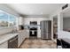 Bright kitchen with white cabinets, stainless steel appliances, and a workspace at 6321 Newtown Cir # 21B4, Tampa, FL 33615