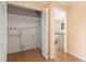 Laundry area with washer/dryer hookups and white louvered doors at 6321 Newtown Cir # 21B4, Tampa, FL 33615