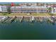 Aerial view of waterfront condos with private boat docks at 637 Pinellas Bayway S # 111, St Petersburg, FL 33715
