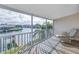 Spacious balcony overlooking a picturesque waterfront community with docks at 637 Pinellas Bayway S # 111, St Petersburg, FL 33715