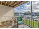 Spacious screened balcony overlooking the water and lush landscaping at 637 Pinellas Bayway S # 111, St Petersburg, FL 33715