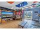Bonus room with large TV, bar, and water views at 637 Pinellas Bayway S # 111, St Petersburg, FL 33715