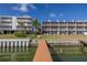 Dock with water views and nearby buildings at 637 Pinellas Bayway S # 111, St Petersburg, FL 33715