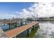 Private dock with boat lift and water views at 637 Pinellas Bayway S # 111, St Petersburg, FL 33715