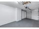 Spacious garage interior with overhead door and white walls at 637 Pinellas Bayway S # 111, St Petersburg, FL 33715