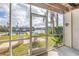 Screened patio with waterfront views and seating at 637 Pinellas Bayway S # 111, St Petersburg, FL 33715